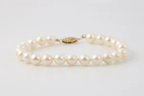 7 14k Yellow Gold Pearl Bracelet (10.76g.)